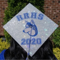 A photograph of a graduation cap that reads RRHS 2020.