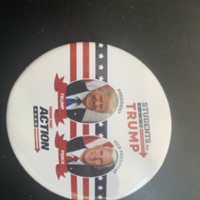 A pinback button shared by a group of students to vote for their presidential candidate during the pandemic.
