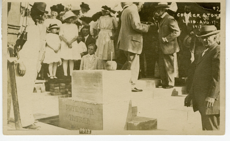 Historical photograph of the cornerstone laying ceremony for the Plymouth Church building.