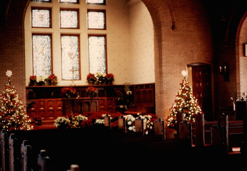 Photo of inside the chapel with a Christmas tree during Christmas time.