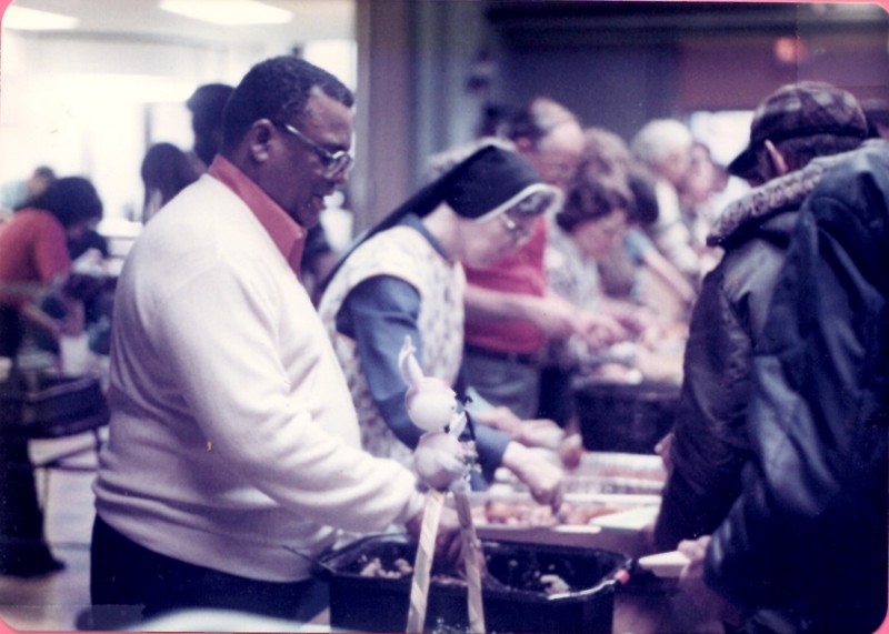 Photograph of the meal program from St. Benedict the Moor parish from the late 1970s.