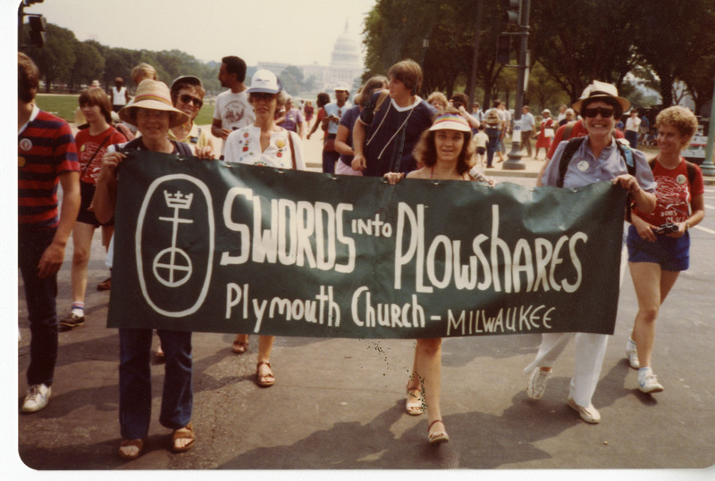 Historical photograph of a group of Plymouth Church members marching in protest of nuclear weapons in Washington, D.C.