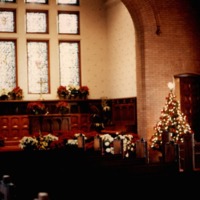 Photo of inside the chapel with a Christmas tree during Christmas time.