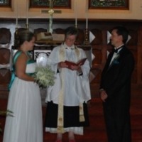 Photo of couple getting married inside the Forest Home Chapel