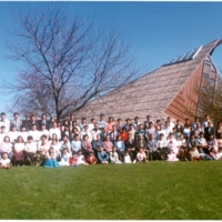 Historical photograph of the CCCM congregation in front of Trinity Community Church, 1988.